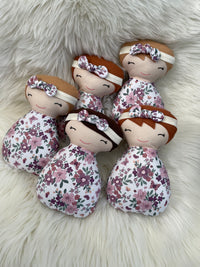 White and Purple Floral Dolls
